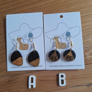 Variatie zwart/goudens hangers